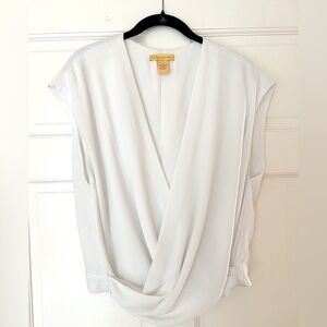 Catherine Malandrino- white, crossover top with 
peek-a-boo lower back